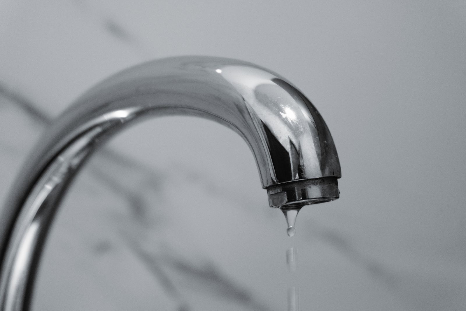 Water dripping from a faucet